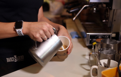 Barista making coffee