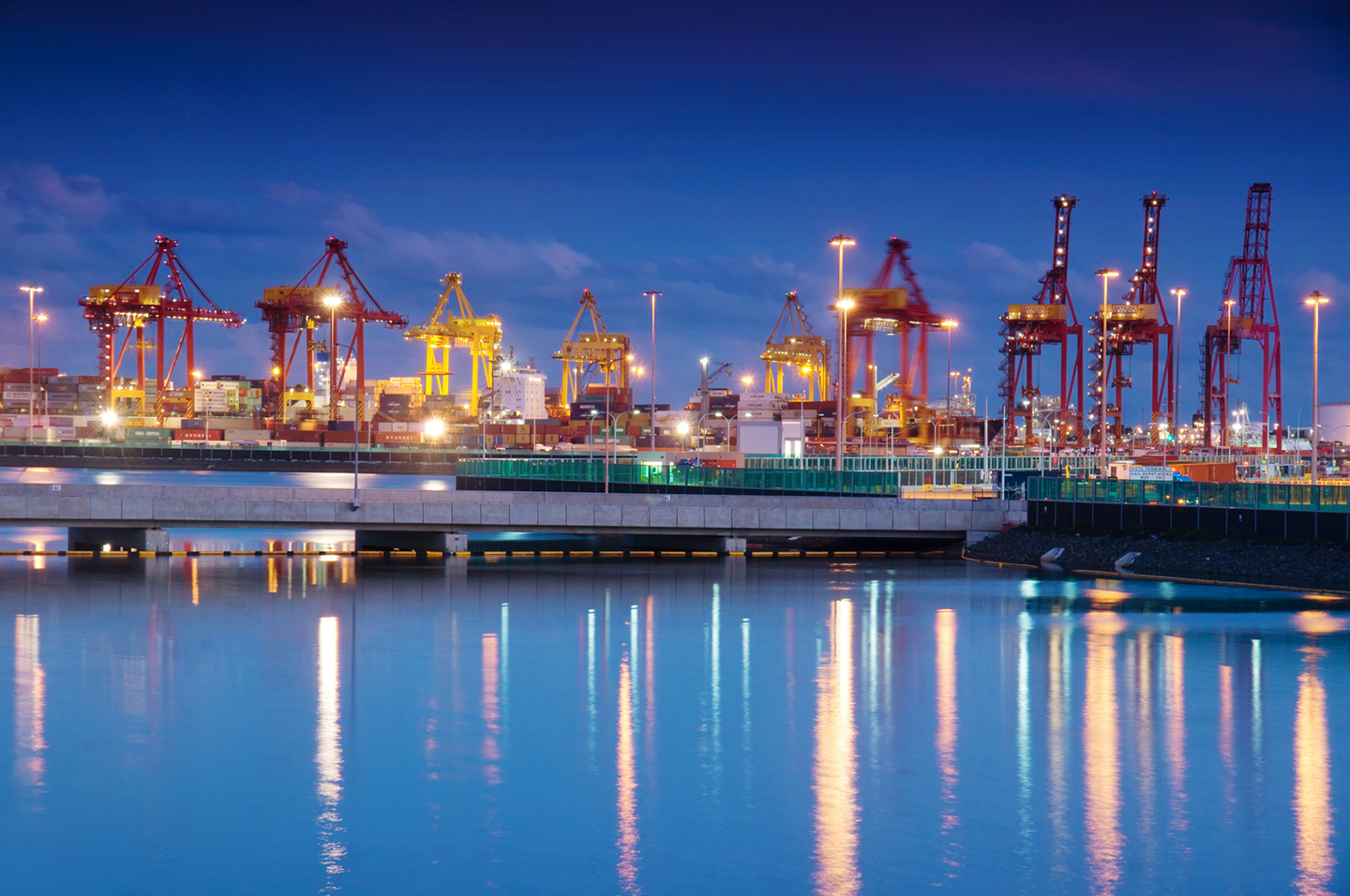 Port Botany at night with reflections on the water