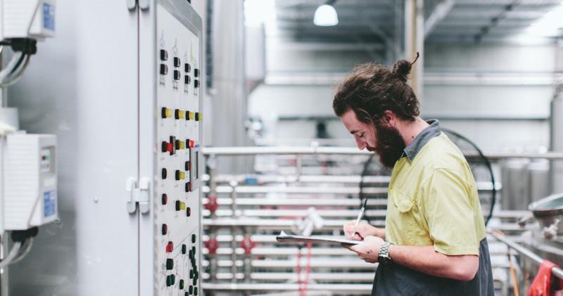 Man looks at power system