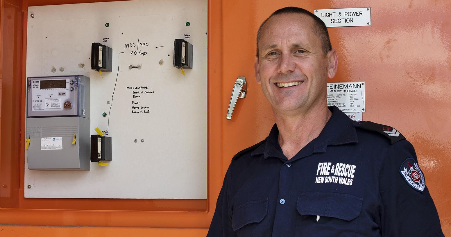 Fire fighter with smart meter at fire station