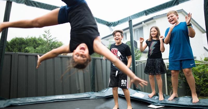 Kids jumping on trampoline