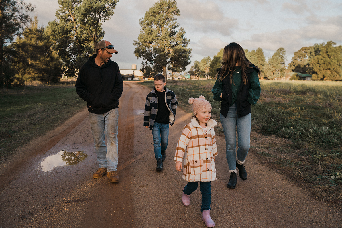 Farming family walking down the road