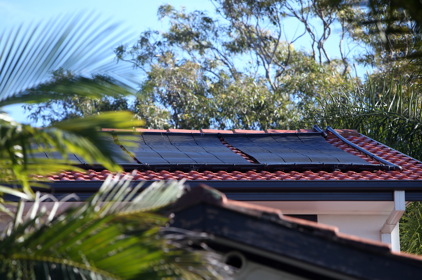 Solar panels on red roof