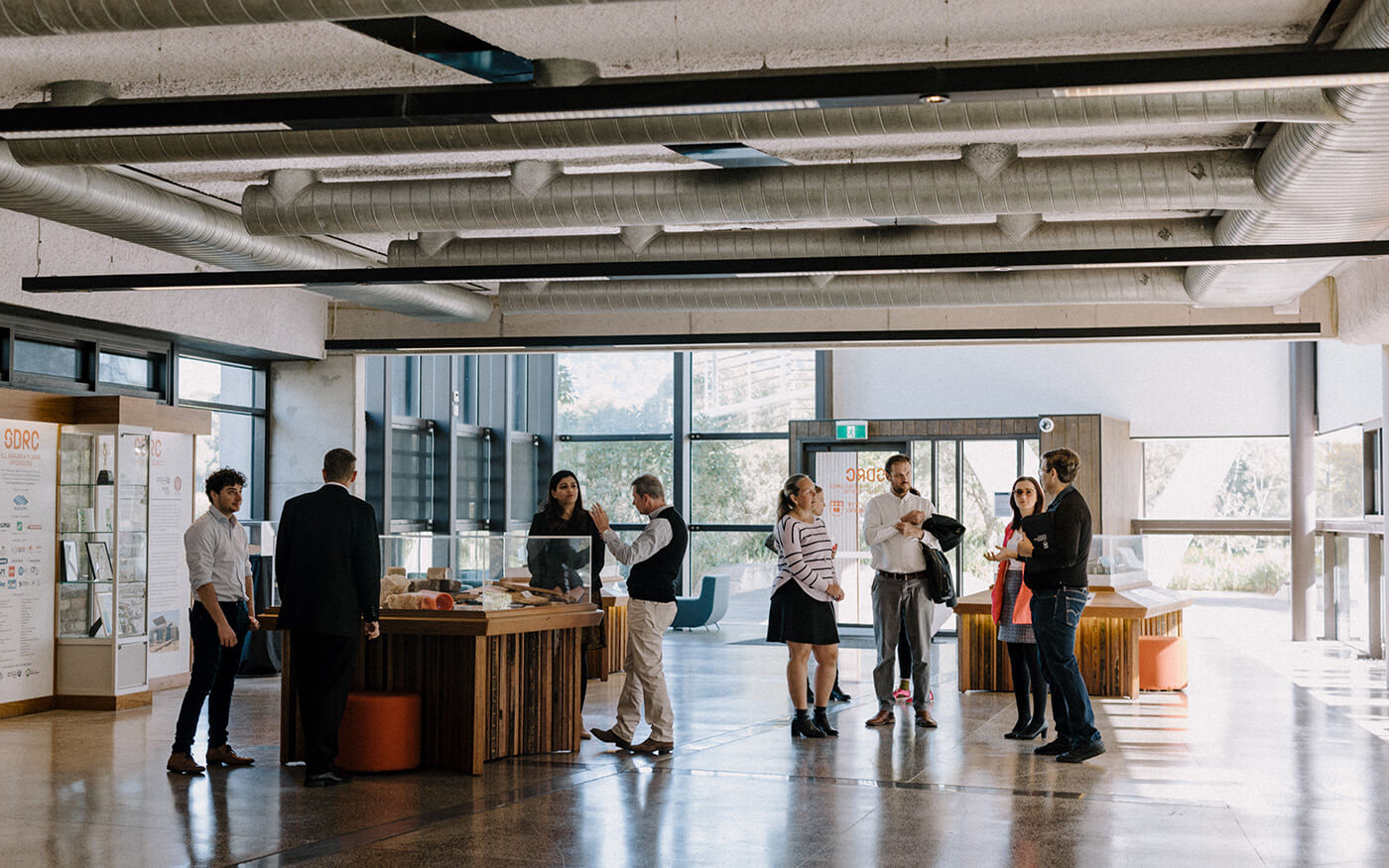 People in contemporary university lab space