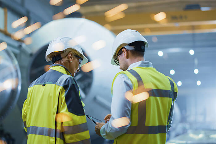 Workers on an industrial process