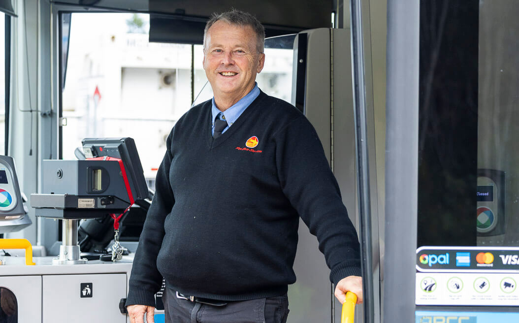 Craig McKenzie, Manager at Red Bus Services smiling