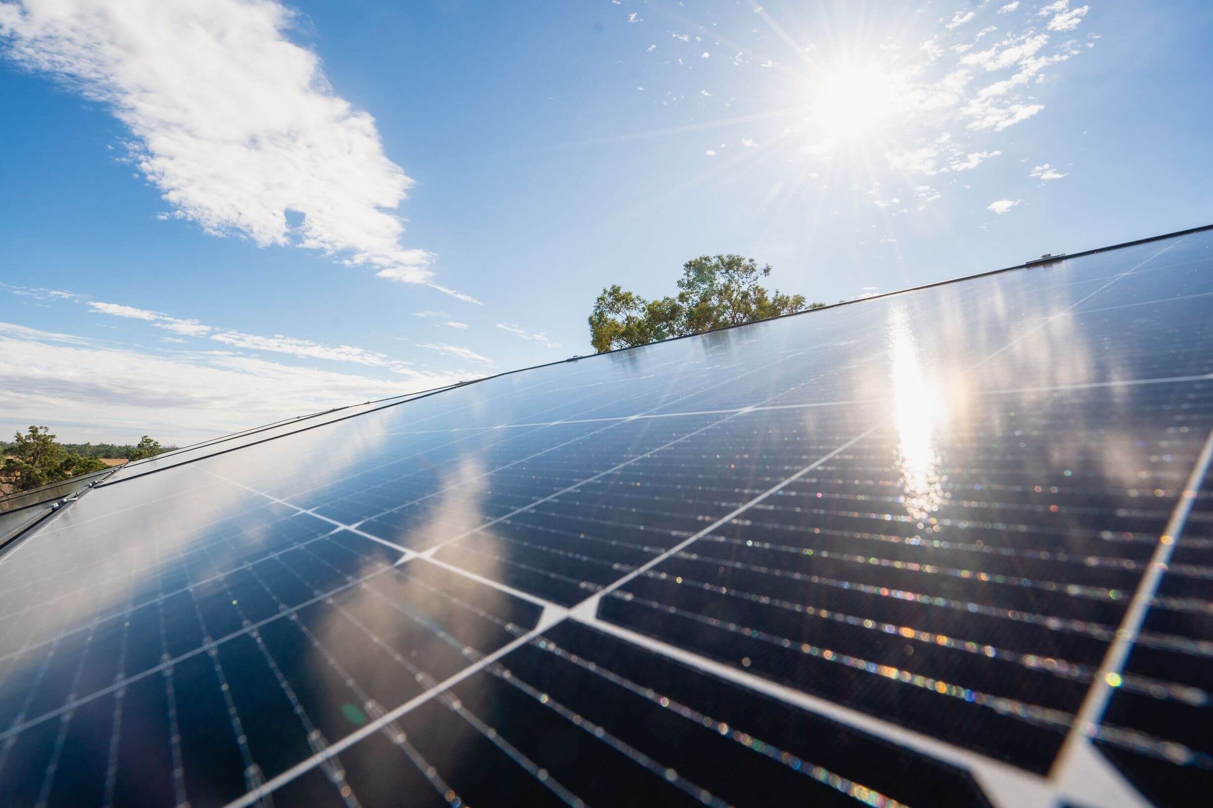 A close up view of solar panels on a roof in daylight