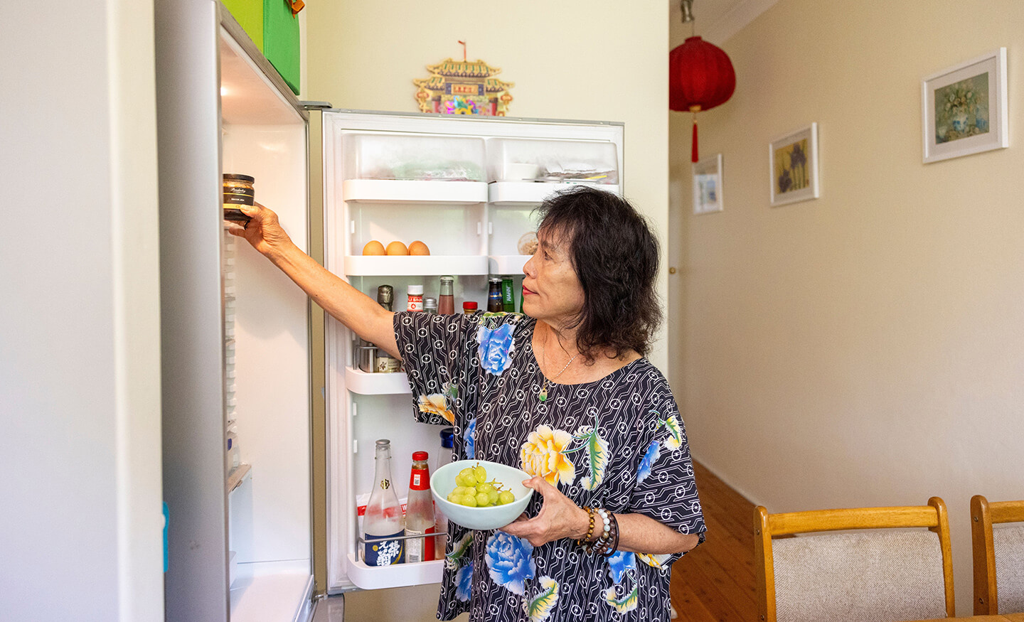 Person using fridge