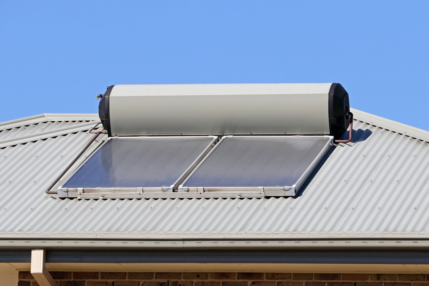 Solar water heater on the roof of a house