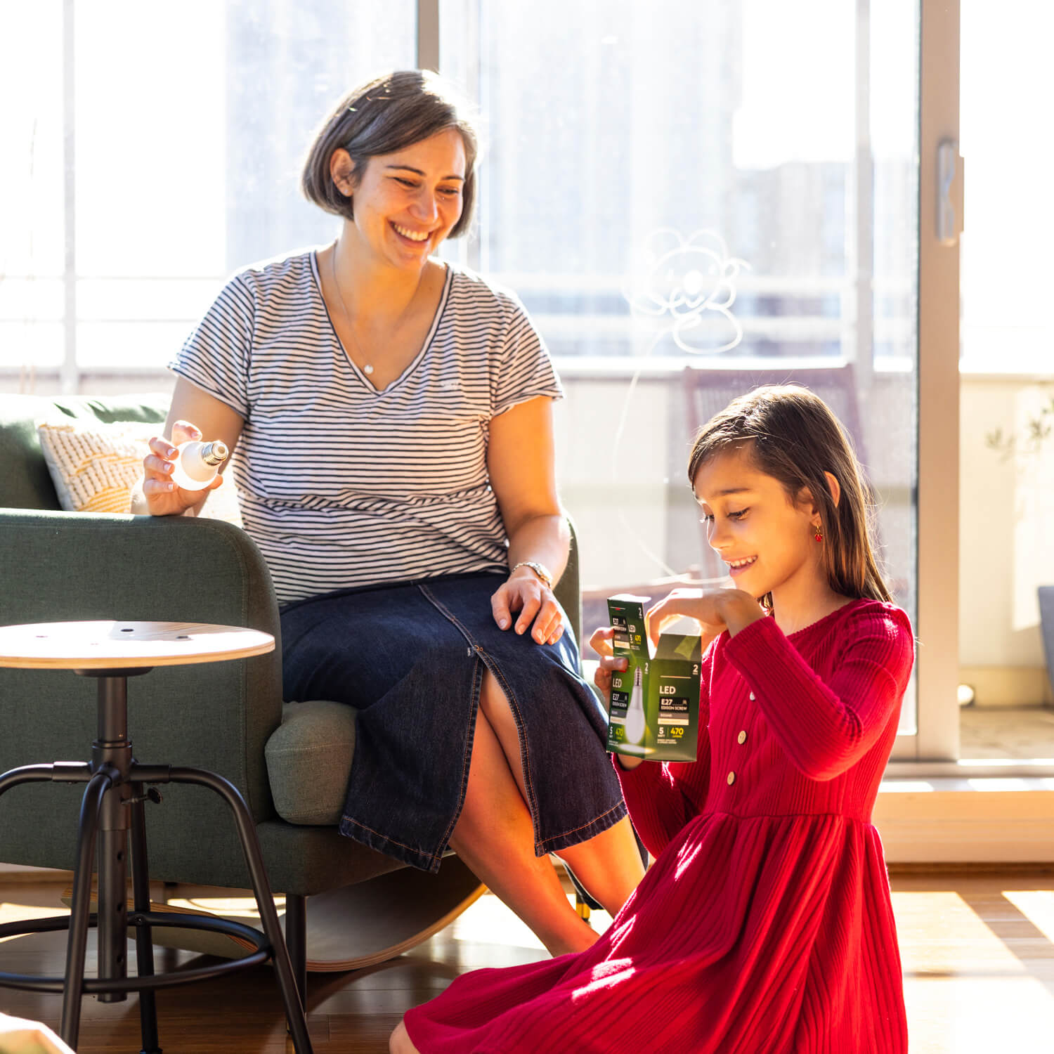 A parent and child at home