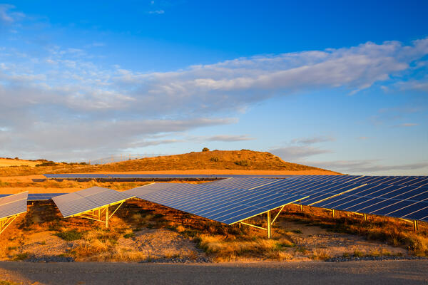 Solar panels on red dirt